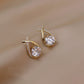 Boucles d'Oreilles Croiséee Cristal