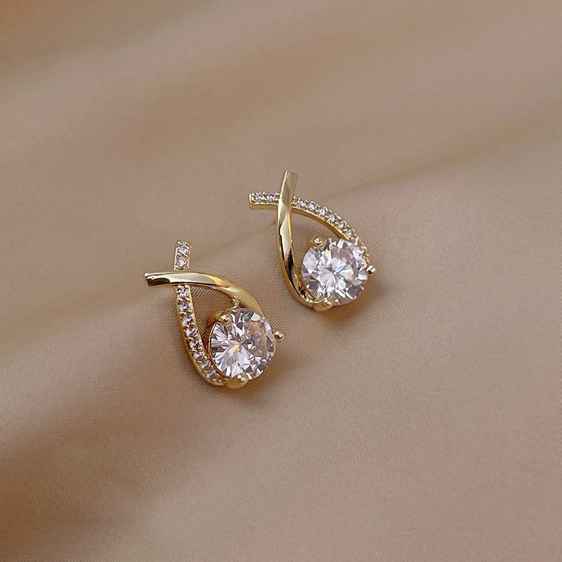 Boucles d'Oreilles Croiséee Cristal