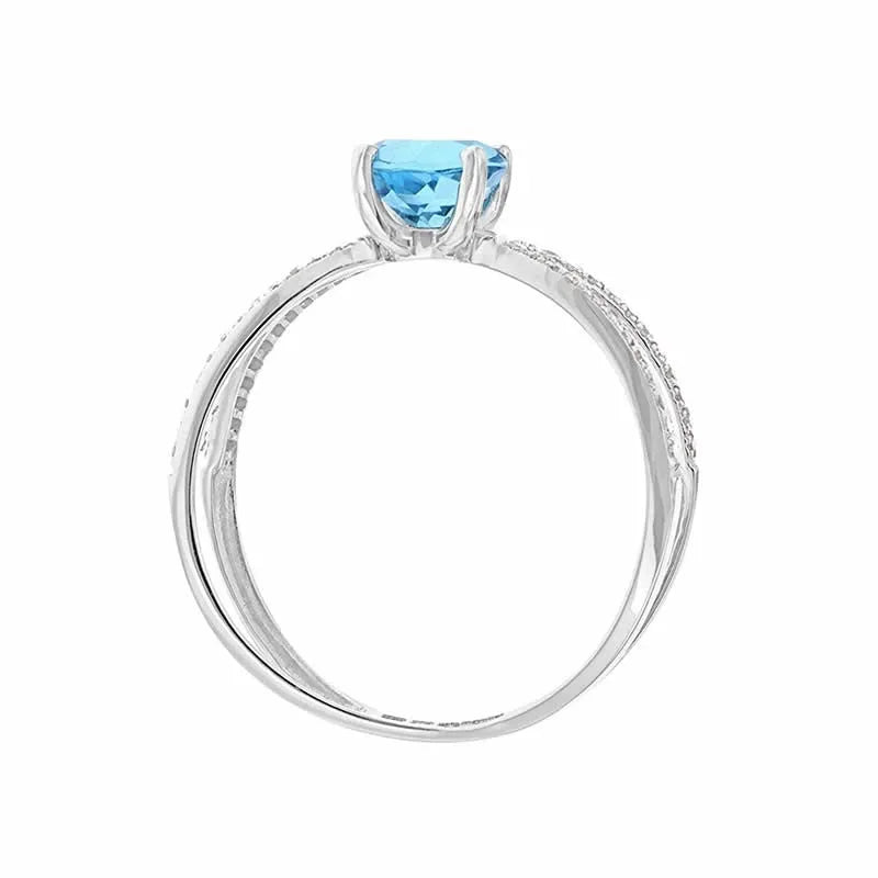 Bague Elliptique Topaze Bleue et zircon