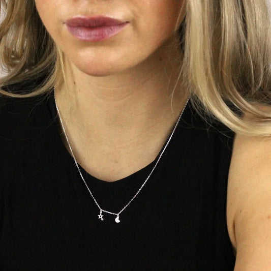 Collier avec étoile et lune en zircone cubique transparent