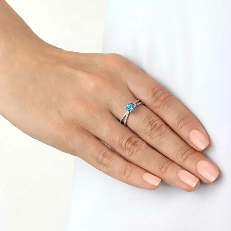 Bague Elliptique Topaze Bleue et zircon