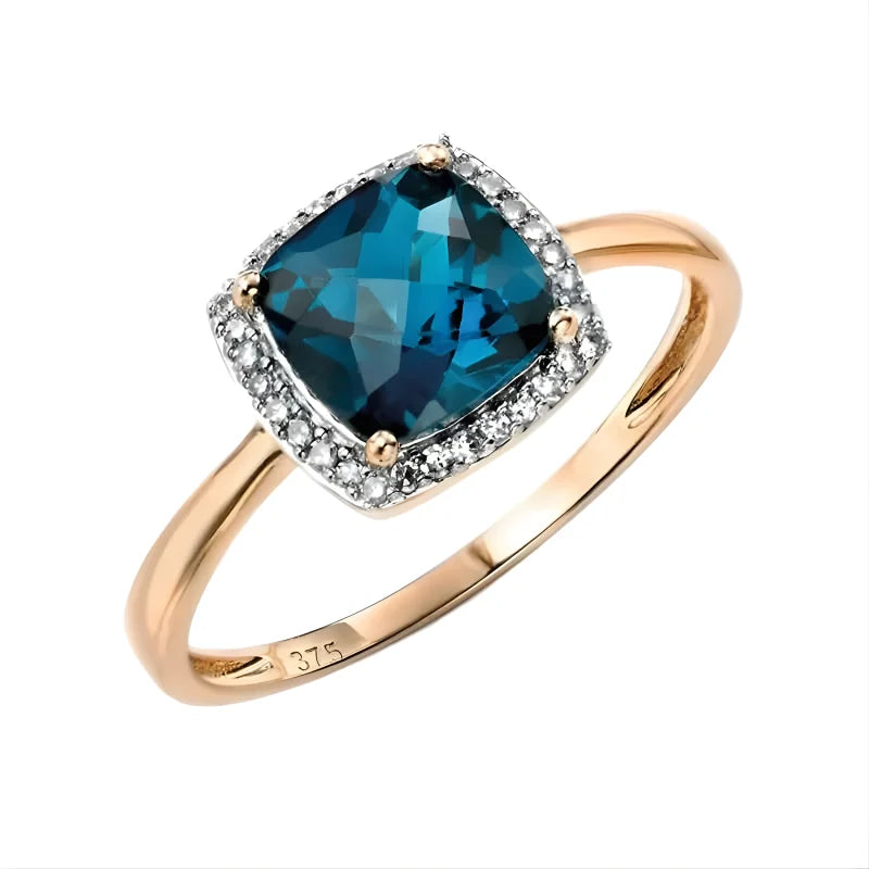 Bague avec topaze bleue de Londres et zircons