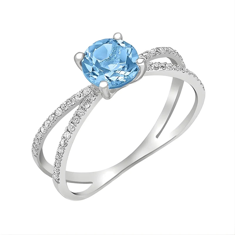 Bague Elliptique Topaze Bleue et zircon